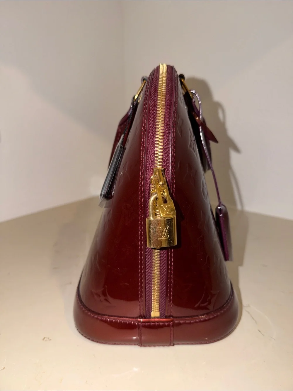 Louis Vuitton Amarante Vernis Alma PM Satchel